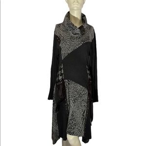 Asymmetric dress with open collar. Fits 12-14